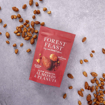 Forest Feast Serrano Chilli & Honey Almonds & Peanuts Roasted Nut Mix 120g opened packet with almonds and peanuts to both sides.