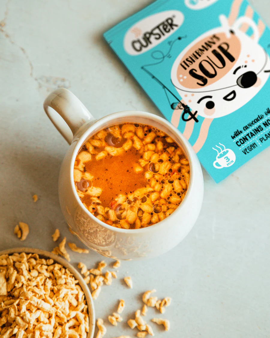 Cupster instant fisherman's soup Cooked with water in a mug showing the soup