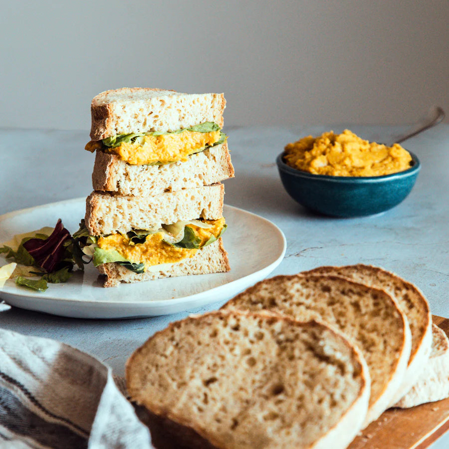 A sandwich made with thick slices of Bake-Free Home-made bread flour mixture thats beek ooked into a loaf