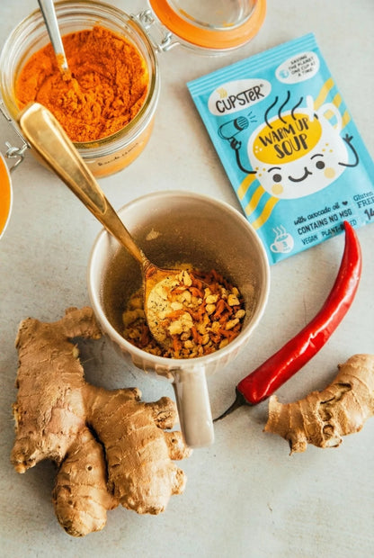 Cup filled with the dried ingredients for Cupster instant turkish red lentil creamsoup.